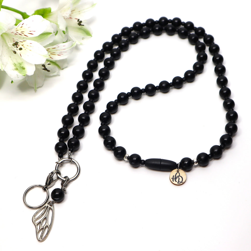 Lakritsi-avainnauha turvalukolla – ekologinen avainkaulanauha