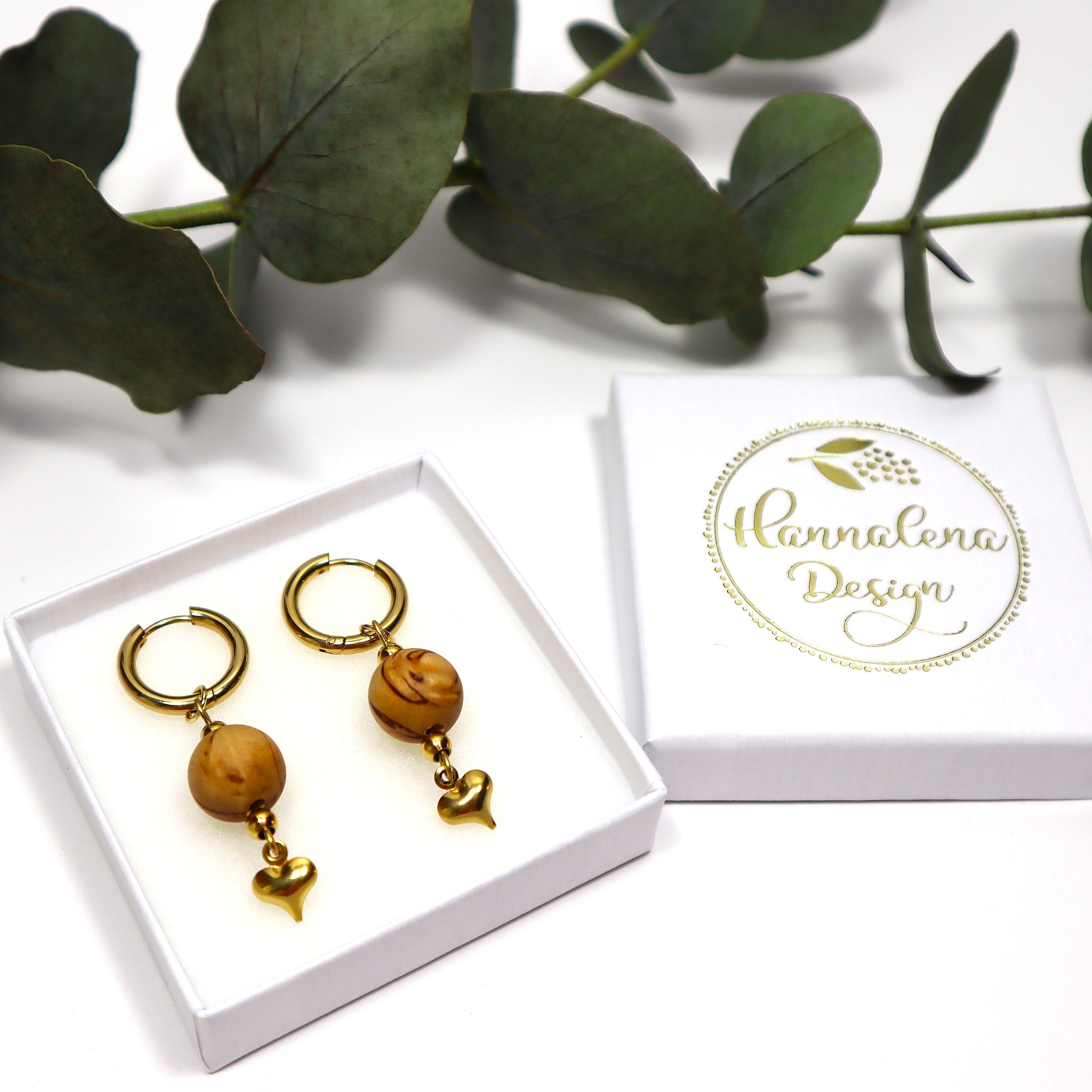 Lovisa-rengaskorvakorut kullattua ruostumatonta terästä ja suomalaista visakoivua