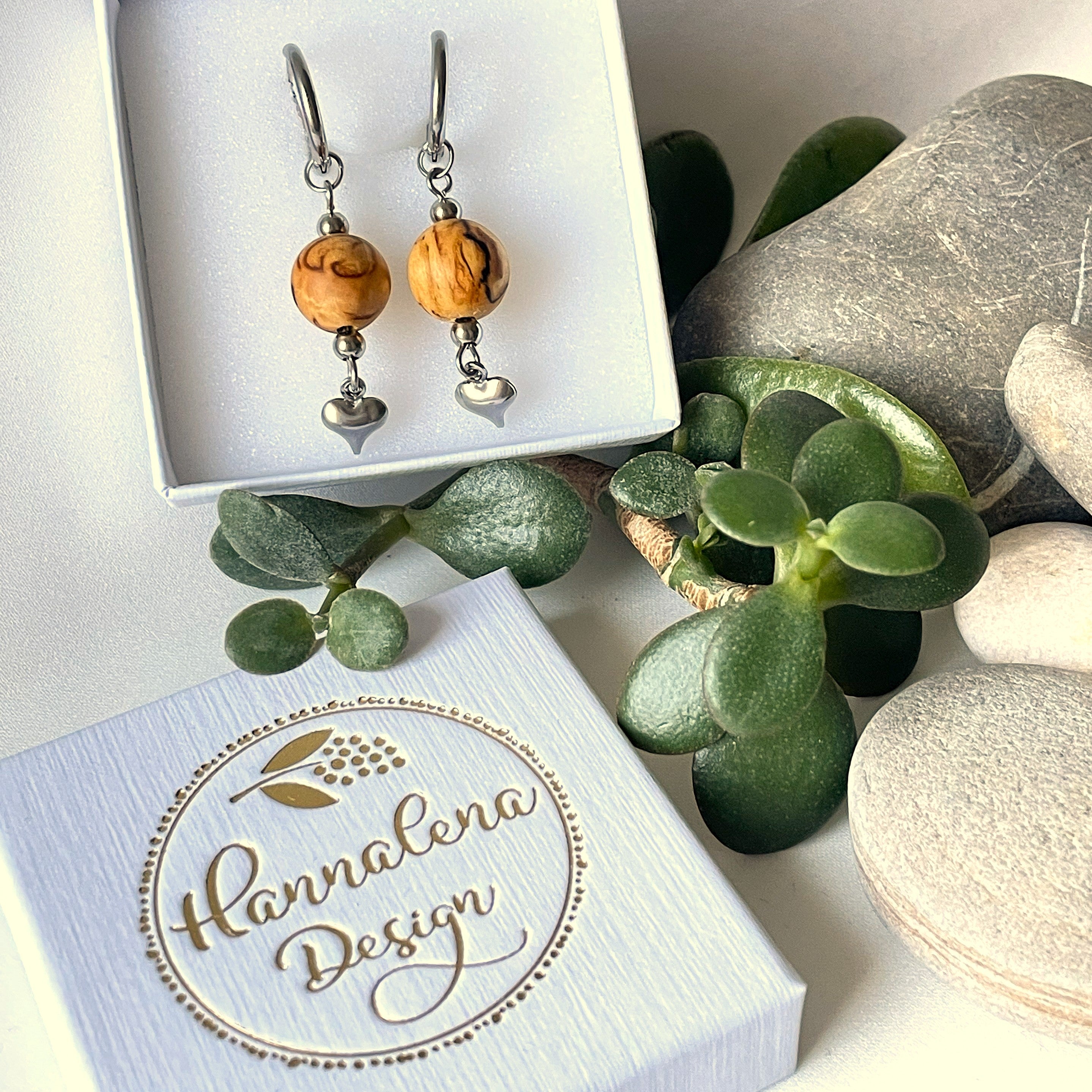 Laadukkaat Lovisa-rengaskorvakorut huggie-renkailla ja visakoivuhelmillä