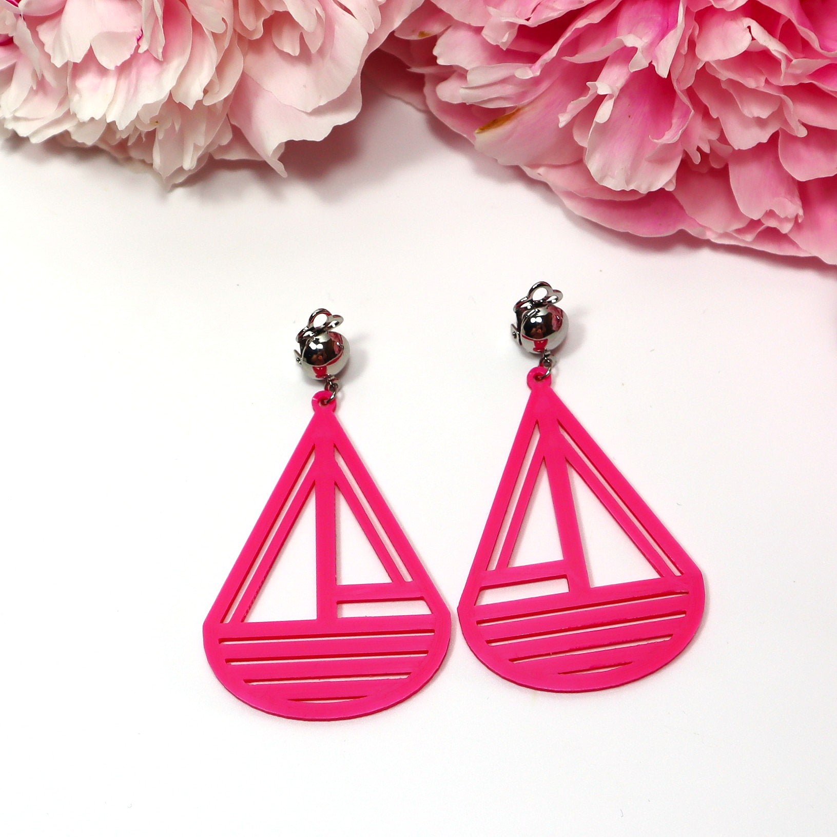 Isot pinkit Styyrpuur-korvakorut klipseillä – ekologiset design-korvikset